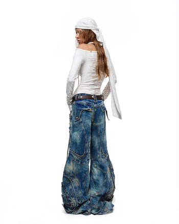 Dekonstruierte ausgestellte Patchwork-Jeans Blau